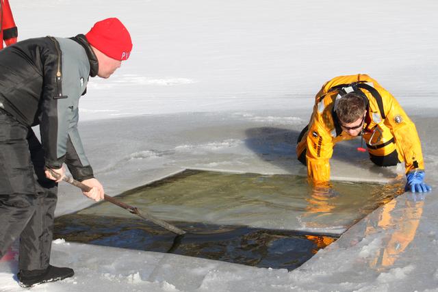 1st LT Rohrauer and FF J.Cobb Moving the ice
